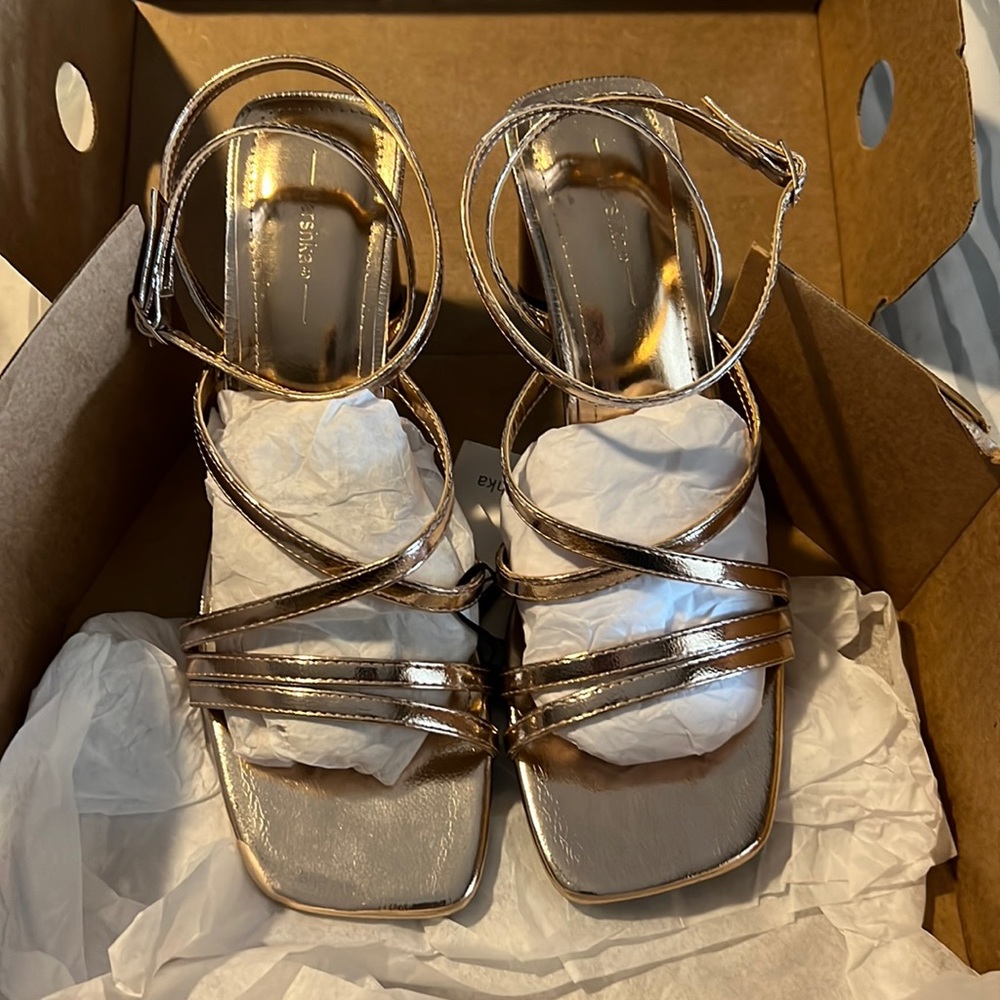 Strappy gold heels